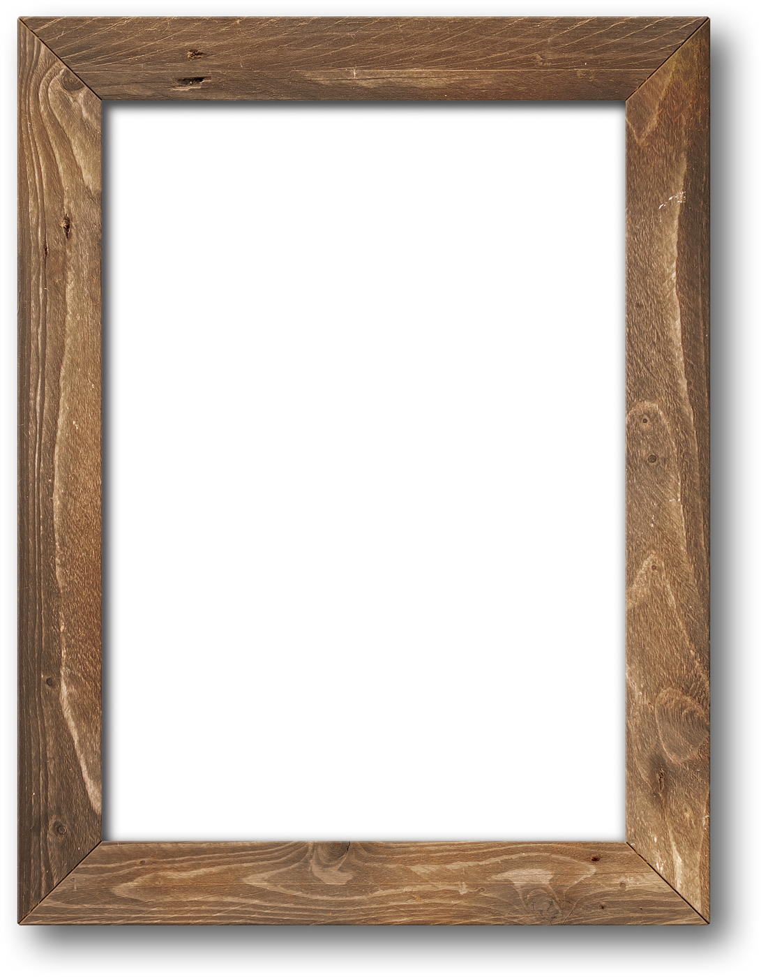 Old rustic wooden picture frame hanging on a white wall